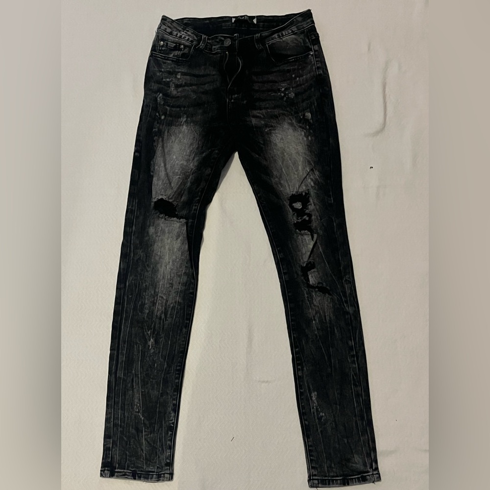 White washed with rips on front AND back